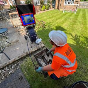 An image of a Drain 247 engineer carrying out a CCTV drain survey.