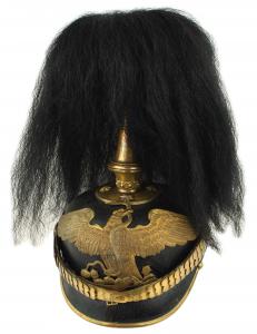 Mexican “Palace Guard” officer’s dress helmet – German-made in the classic style of the Imperial Era – a rare, circa 1900 helmet, with correct type Mexican colors rosettes (MB: $4,700).