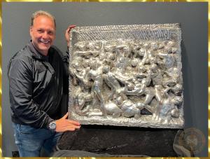 Mark Russo stands next to the one and only Officially Authorized Pure Silver Battle of the Centaurs by Michelangelo Buonarotti 