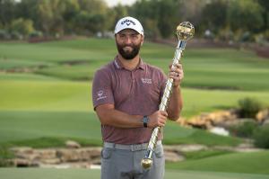 ROLEX TESTIMONEE AND 2022 CHAMPION, JON RAHM, WITH THE DP WORLD TOUR CHAMPIONSHIP TROPHY
