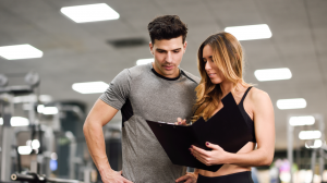 Irvine personal trainer helping client with weight loss tips