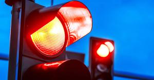 image of two red lights - Belle Isle, Florida red light camera program is expanded