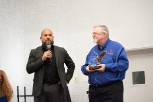 Jason Trimiew, of Meta accepting the Presidents Award.