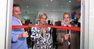 Daniel Shapiro, director and co-founder of Alefbet Holdings, MEC for Economic Development Gauteng, Ms Tasneem Motara and Michael Muth, Commercial Officer at the US Department of Commerce, prepare to officially open iContact BPO’s new contact centre in Hou
