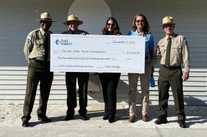 Members of the Florida State Parks Foundation, Duke Energy Florida and the Florida Park Service celebrate a partnership to install more than 121 water bottle refilling stations in state parks across Florida.