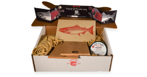 Eva's Wild Chef Box with alder wood planks and chef apron