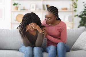 Friend supporting a love one struggling with grief