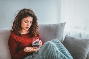 woman taking antidepressant medication