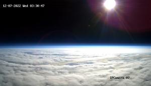 Photo of the horizon from Near Space with sun rising taken from HALO Space's capsule