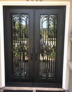 Ornate Iron door installed into home