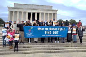 Youth and advocates gather at the Lincoln Memorial to promote and educate on human rights