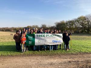 Clayton team members plant trees at Gray Branch Community Park in McKinney, TX