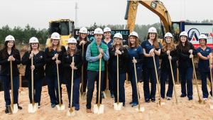 rogers and andrews team with shovels at groundbreaking ceremony
