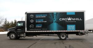 A side view of Crownhill Packaging's new branded trucks showcasing the truck wrap design.