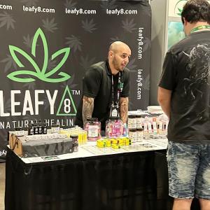 One of the partners from Leafy8 conversing with an interested Alt Pro 2022 attendee.