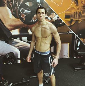 Yassine Ohid, Moroccan Table Tennis Champion showing off his muscles after a bodybuilding session