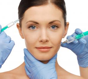 woman having BOTOX and dermal filler injected