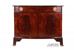 Federal mahogany bow-front press cabinet, New England, probably Boston, dated April 24th, circa 1802.