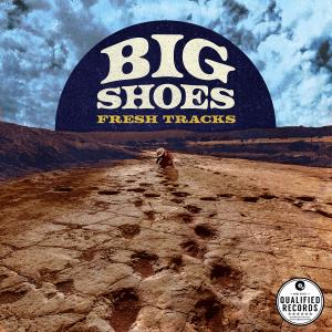 Album cover depicting footprints on a dirt path