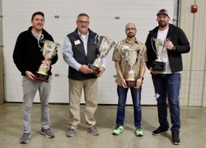 (from left to right) Chase Vienneau of Arrington Vineyards holding the Governor's Cup Trophy for Middle Tennessee, Bart Horton of Century Farm Winery holding the Governor's Cup Trophy for West Tennessee, James McKinney of Apple Barn Cider House holding th