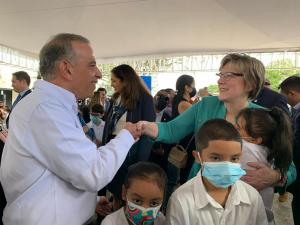 Juan Carlos Atala of the Ficohsa Foundation joins Ambassador Dogu & local children at the launch of the alliance to support education.