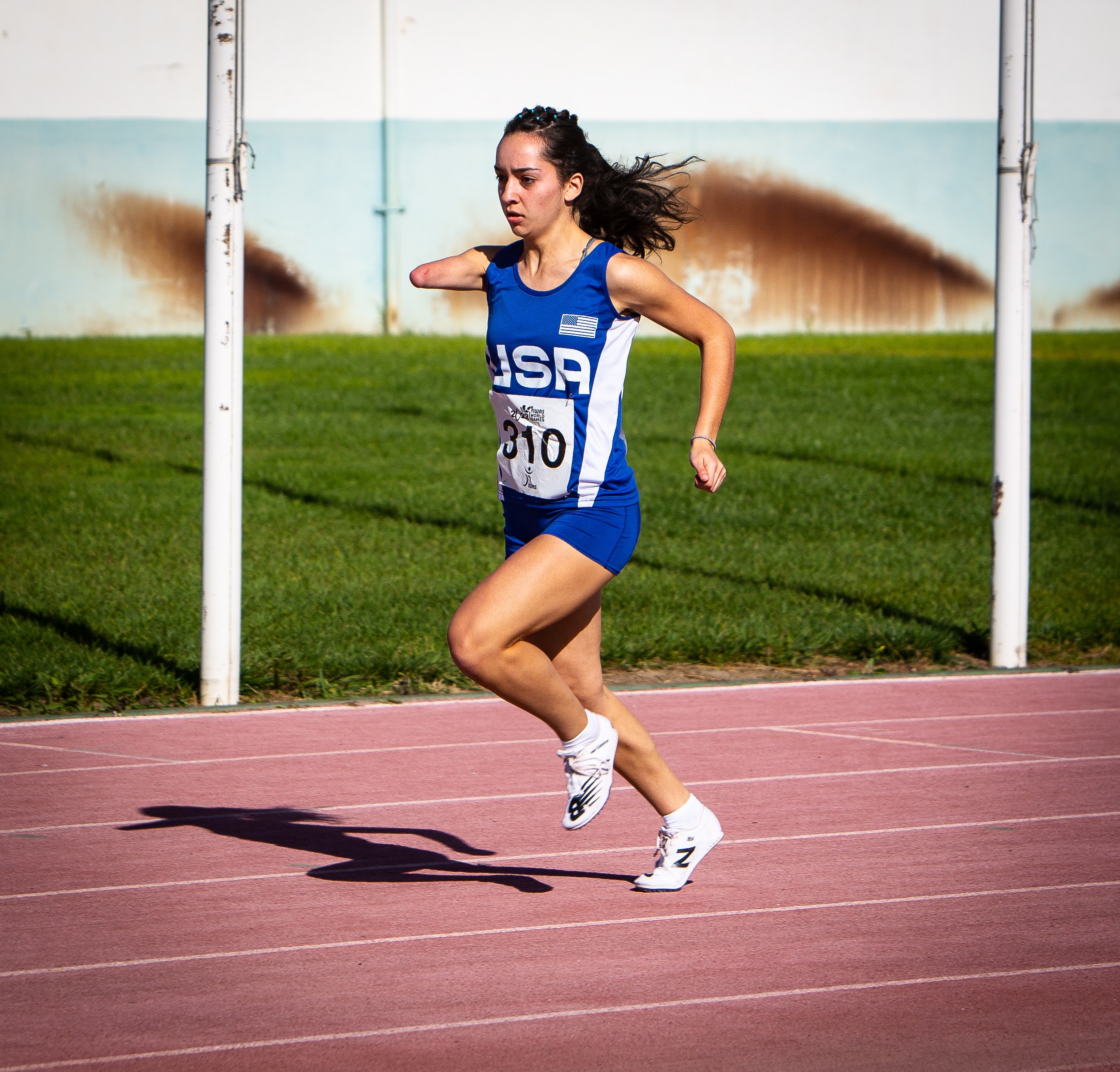 Emily Lopez competing on a track