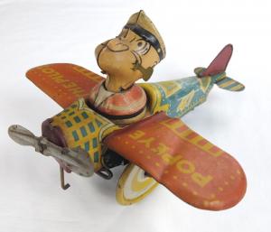 Rare and highly collectible circa 1930 Popeye the Pilot tin wind-up toy plane made by Marx (est.$1,000-$1,500).