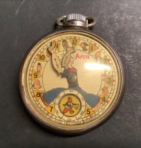 Popeye pocket watch made in 1934 by New Haven Watch Co., in fine working condition. Popeye’s arms tell the time; a second wheel shows Wimpy chasing a hamburger (est. $1,000-$5,000).