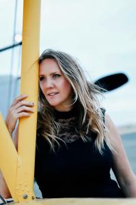 This is a photo of Flying Yacht Company founder and CEO Michaela Renee Johnson.