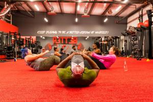 Kwan Sadler teaching situps to class at Better Me Fitness and Performance in Aubrey Texas