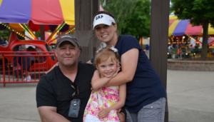 Avenues for Autism family they serve smiling at event