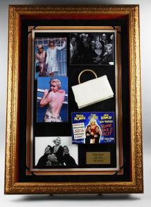 Dedication shadowbox for the movie Some Like It Hot (1959), featuring stills from the film and a small purse signed by Marilyn Monroe, Tony Curtis and Jack Lemmon (est. $5,000-$1,000).