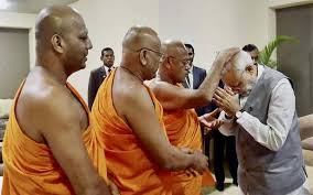 Modi with Mahavamsa Sri Lankan Sinhala Buddhist priests who preach the killing of Tamils and Hindus is acceptable