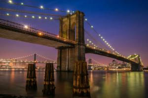 The Brooklyn Bridge at night.