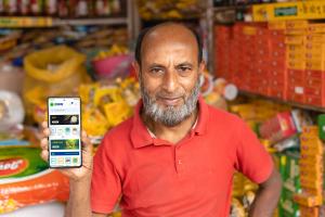 A ShopUp retailer using Mokam