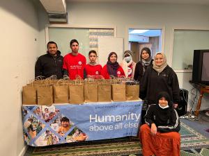 Representatives from Altenew prepared winter packages for local refugees in the face of Winter Storm Elliot.