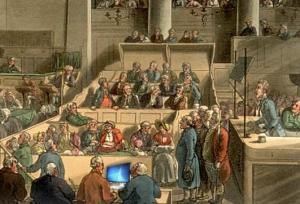 Ancient courtroom with modern computer monitor in use