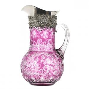 Brilliant Period Cut Glass amethyst cut to clear water pitcher attributed to Stevens and Williams, 11 ¼ inches tall, with engraved floral and scroll design and a sterling silver spout (est. $10,000-$15,000).