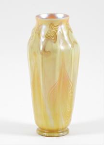 Exquisite late 19th/early 20th century Louis C. Tiffany (N.Y.) ribbed vase, 9 inches tall and very shapely, boasts a yellow iridescent pulled feather design (est. $2,000-$3,000)