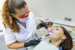 Woman getting dental care with sedation dentistry