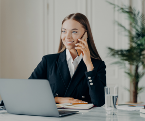 An employee on the phone looking happy