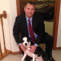 Eric Kaasa in Suit with Dog