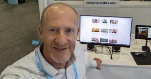 Bryan Krehnbrink, Founder headshot photo at exhibit hall