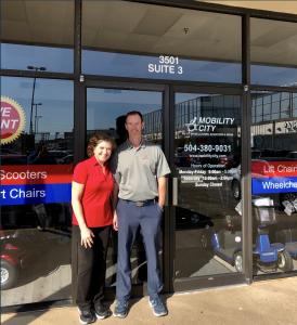 Michele and Jeff Varon standing outside their showroom ready top welcome visitors.