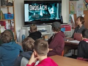 Czech volunteers reach out to youth with-drug education lectures.