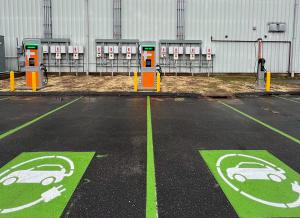 Two ChargePoint DC Fast and One Level 2 EV Charging Stations in Front of Building