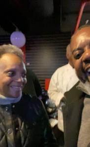 Chicago's Mayor Lightfoot and Influencer Ivan D. Ray laughing