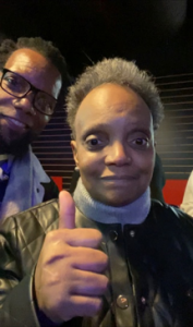 Chicago's Mayor Lightfoot and poet kweisi gharreau having a good time