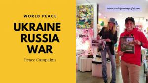 The Ukraine Russia Peace Campaign with Miss Ukraine, Olga Rechdouni for Social Good. Pictured Kristen Thomasino, Creator of Thomasino Media LLC holding "The Social Good Magazine Volume 2" in Duroque