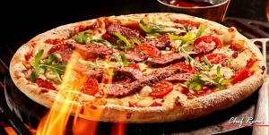 Want to impress your family and friends by cooking a pizza directly on your BBQ grill?